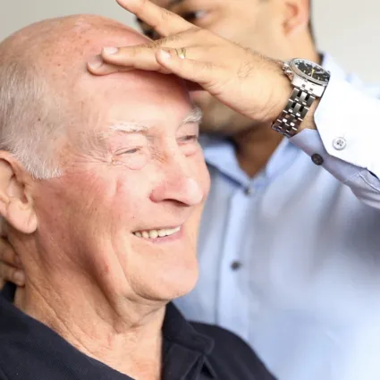 A patient undergoing chiropractic treatment
